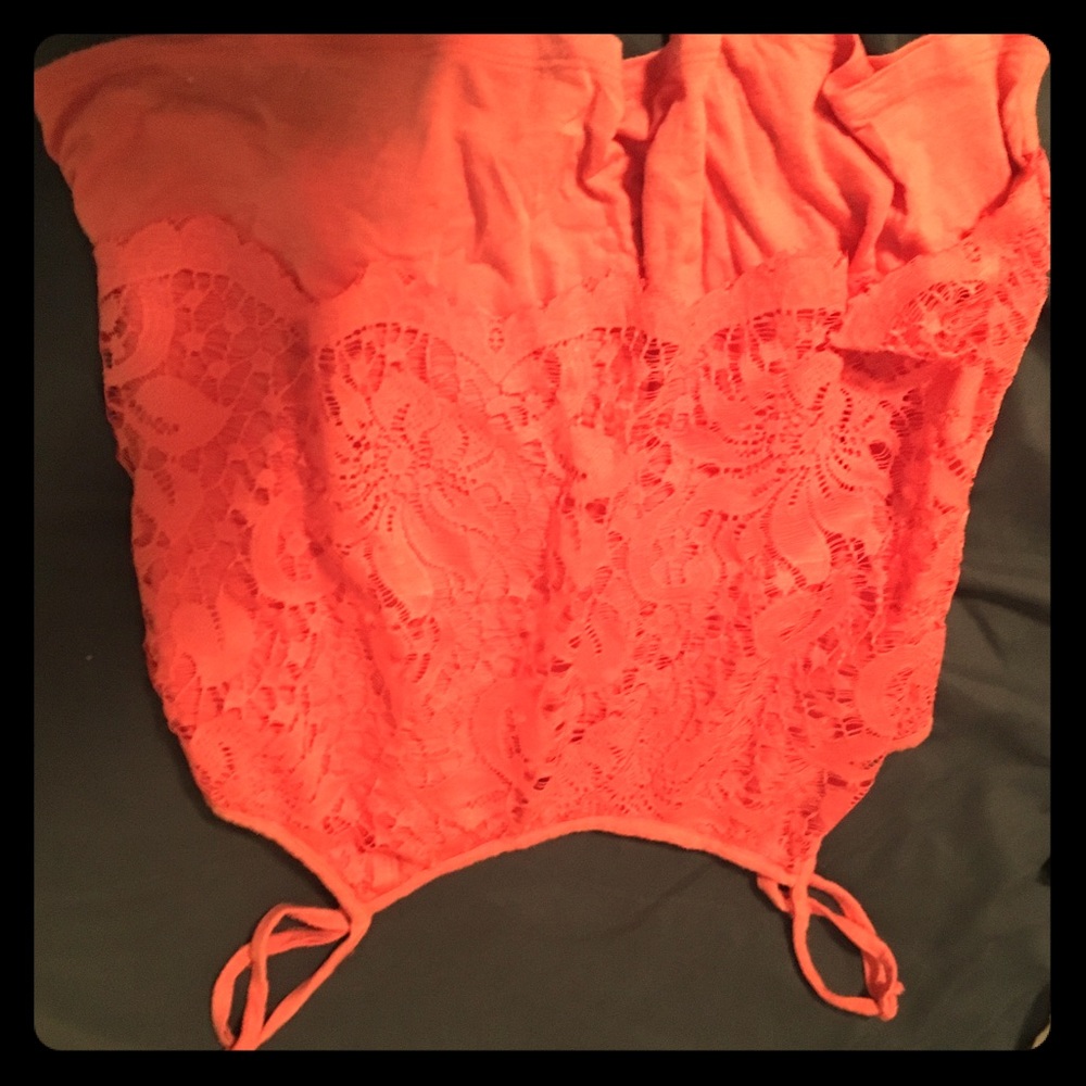 Tangerine colored tank top